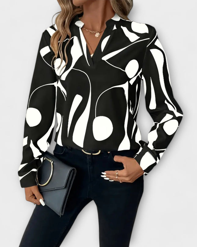 Elegante langärmelige Bluse mit spitzem Ausschnitt