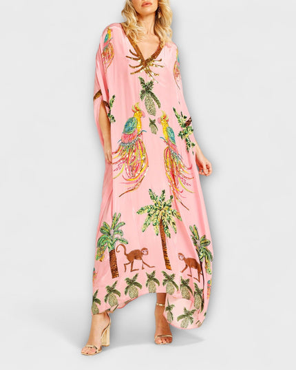 Annika - Auffälliges Kleid mit schrägen Schultern und Kokosbaum-Print