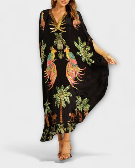 Annika - Auffälliges Kleid mit schrägen Schultern und Kokosbaum-Print